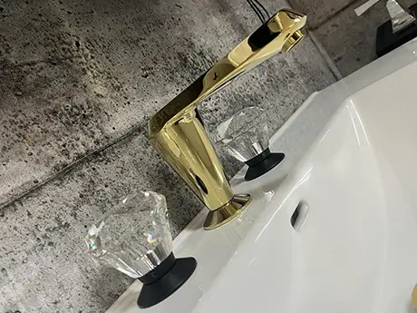 Gold faucet on display
